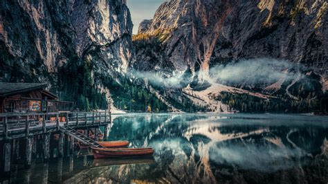 Download Lake Boats Pier Mountains Reflections Nature 1366x768
