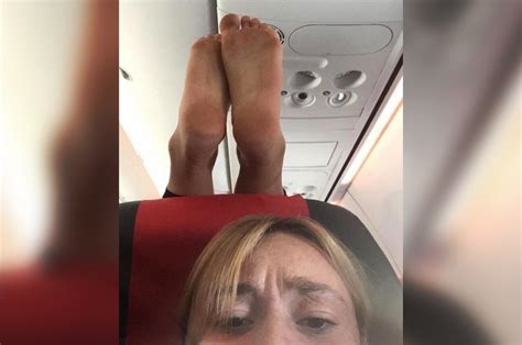 Revolting Passenger Puts Feet On Airplane Headrest In Horrifying Photo