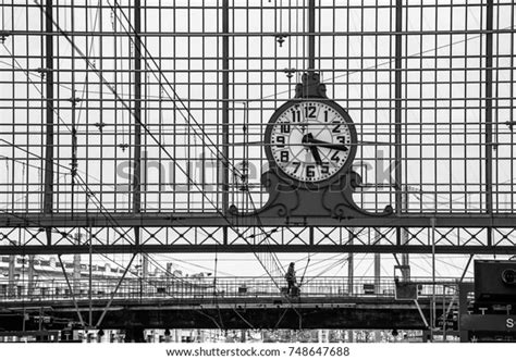 Classic Train Station Clock Hanging Onto Stock Photo 748647688