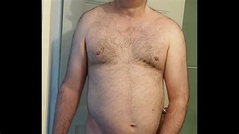 Nude Martin Lavallée mastubates ejaculates and eats his sperm with his