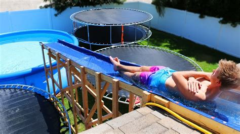 Giant Backyard Water Slide In Our Trampoline Water Park Youtube