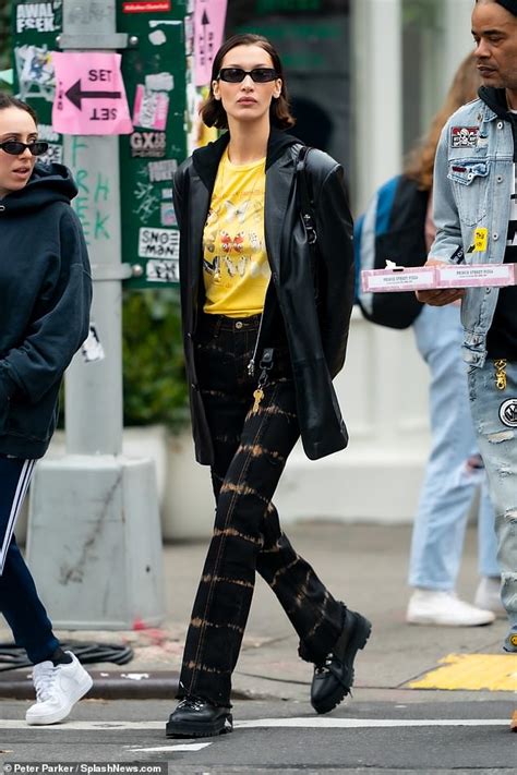 These boys and gals come in all shapes and sizes, but what they all have in common is that they're all men and women that bella. Bella Hadid models a yellow butterfly shirt in NYC after ...
