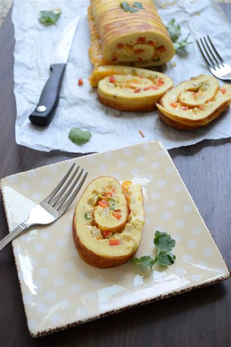 Cheesy Egg Roulade Recipe With Red Bell Pepper And Onion Whisk Affair