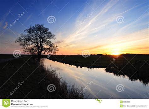 Start date mar 19, 2019; Sunset in The Netherlands stock photo. Image of lake ...