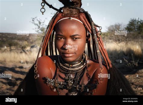 Portrait Of A Himba Woman Dressed In Traditional Style In Namibia