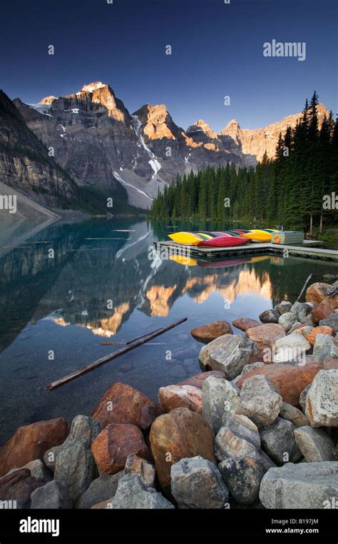 Moraine Lake With Canoes Banff National Park Alberta Canada Stock