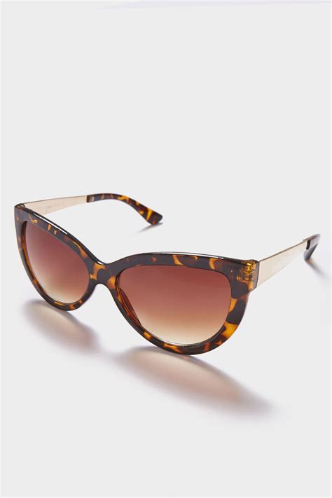 tortoiseshell cat eye sunglasses with gold tone arms and with uv 400 protection