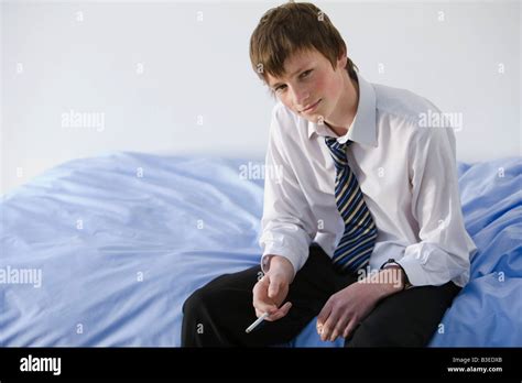 Portrait Of A Teenage Boy Smoking Stock Photo Alamy
