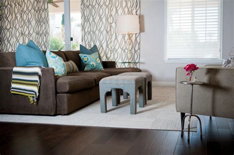 Do grey cushions go with brown sofa. Neutral Modern Family Room With Comfy Brown Sofa | HGTV