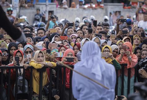Indonesias Aceh Canes Couples For Public Shows Of Affection The Mainichi