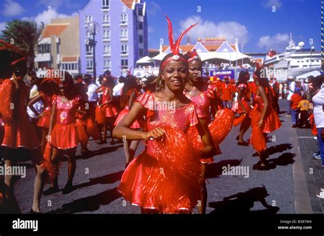 Dancers In Colourful Costume Taking Part In Carnival Procession Held On Willemstad S Waterfront