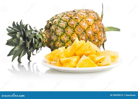 Fresh Juicy Nutritious Cut Pineapple With Whole Fruit As Backgro Stock