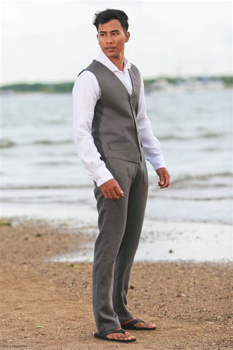 For a laid back but still stylish beach wedding attire for men, combine a pair of tailored (as opposed to more casual draw string) white linen pants, a crisp tailored shirt (striped will look very nice or else something like the white shirt featured in the picture above with the blue and purple checkered and. Men's Linen Gray Dress Pants - Island Importer