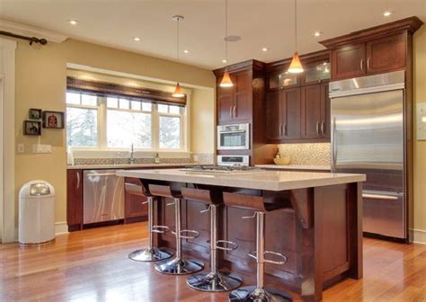 Traditional dark wood cherry kitchen cabinets with cherry floors warm wall color what others are saying traditional dark wood cherry kitchen there are several wall colors that work well with dark cherry wood but each creates a different effect. wall kitchen colors with cherry cabinets | Cherry cabinets ...