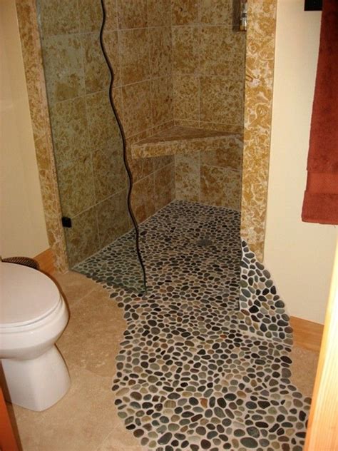 Bathroom floor tile is available in a surprising range of materials, from vinyl and ceramic to wood, stone, and glass. Shower Pebble Stone Floor | Stone shower floor, Tile ...
