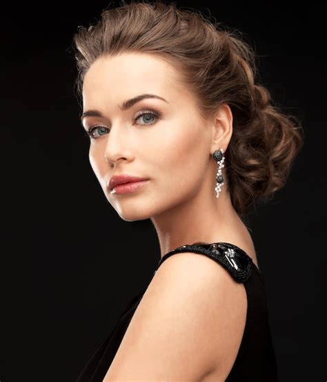 Premium Photo Beautiful Woman In Evening Dress Wearing Diamond Earrings