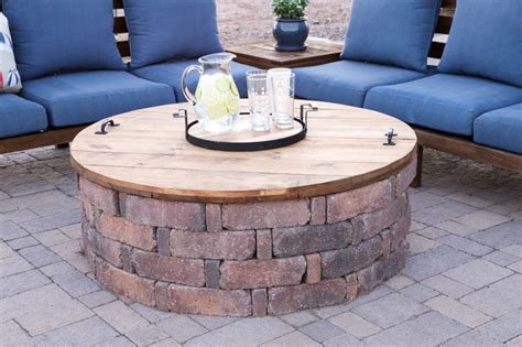 You can make simple round fire pit made of cinder blocks with less than $40. How To Build A DIY Fire Pit Cover - Addicted 2 DIY