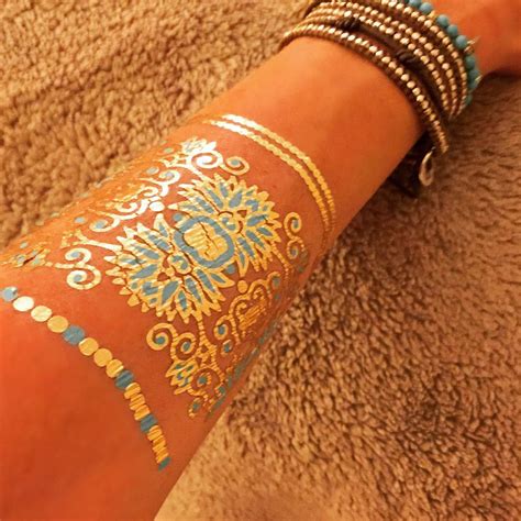 Don't let the price fool you — this drugstore staple is truly the gold standard. 50 Gold Tattoo Designs And Ideas For Women - Feel Like a ...