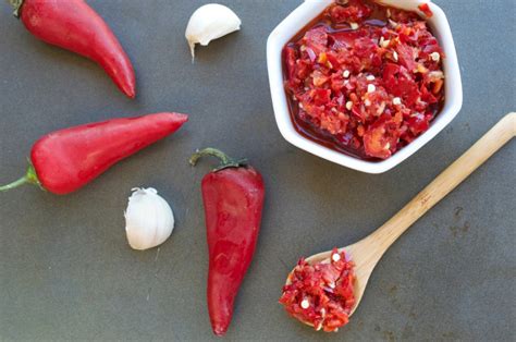 Chili garlic sauce, a little bottle of fiery, tangy goodness. Chili Garlic Sauce | Plaid & Paleo