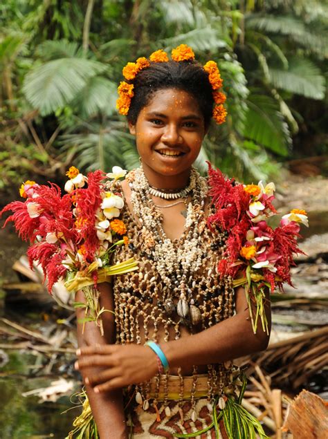 An Indigenous Papua New Guinea Woman In Traditional Dress For The