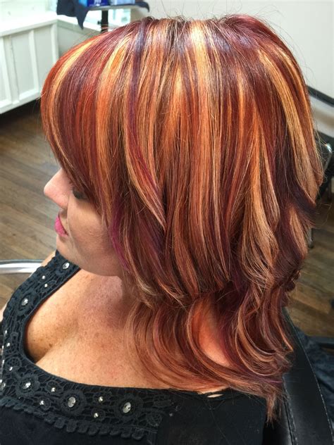Vibrant Red Hair With Copper And Plum Highlights
