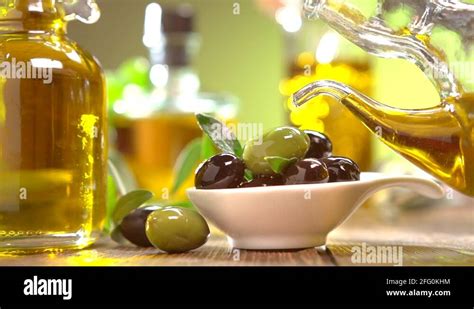Olives And Pouring Olive Oil Extra Virgin Olive Oil Pouring From A Jar Stock Video Footage Alamy
