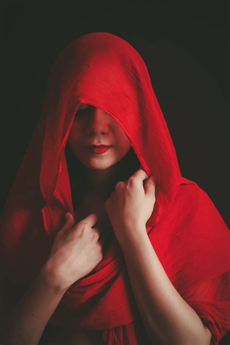Woman Covering Her Face With Red Textile Photo Free Red Image On Unsplash