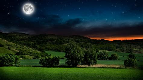 Full Moon On The Starry Sky Above The Green Hills Wallpaper Backiee
