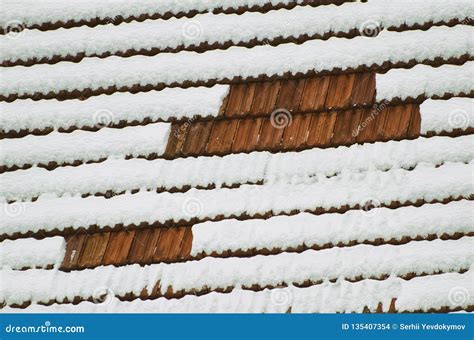 The Roof Of Clay Tiles Covered With Snow Texture Stock Photo Image