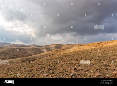 View Of The Rocky Hills Of The Judean Desert Under A Stormy Sky