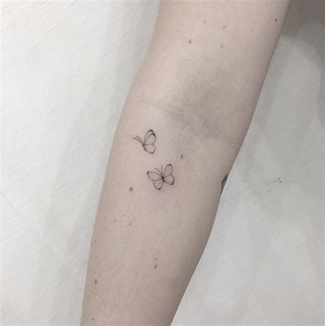 17 Best Tiny Minimalist Butterfly Tattoo Ideas