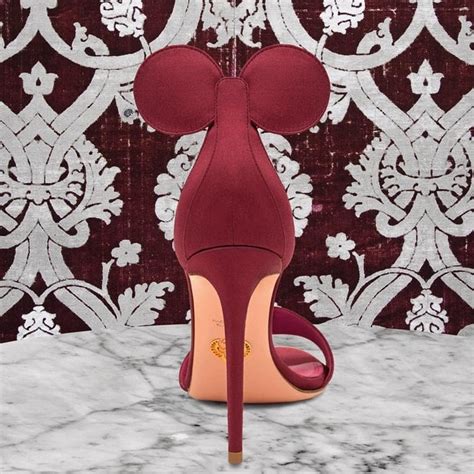 She completed her outfit with rebecca de ravenel earrings and black suede 'minnie' heels from oscar tiye that you can buy at farfetch and moda operandi. Minnie Mouse Ear Heels: Oscar Tiye's Disney Shoes Worn by ...