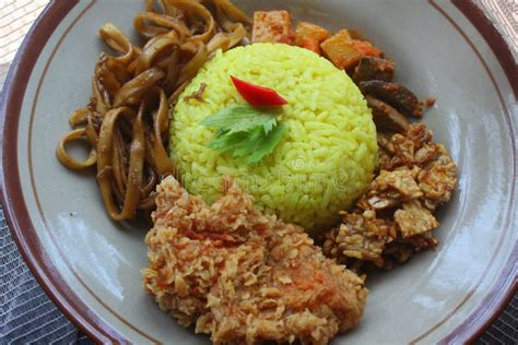 Yellow Rice With Various Indonesian Side Dishes Stock Image Image Of