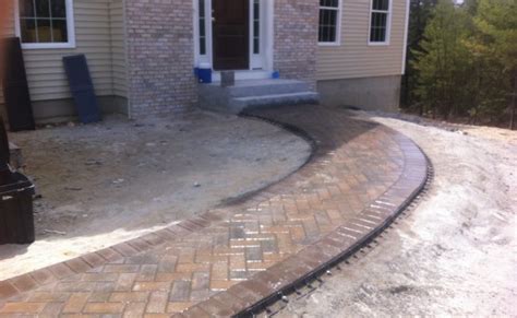 The brick herringbone walkway guides a visitor through the dwarf fruit trees in the orchard. Brick Walkway Herringbone Pattern