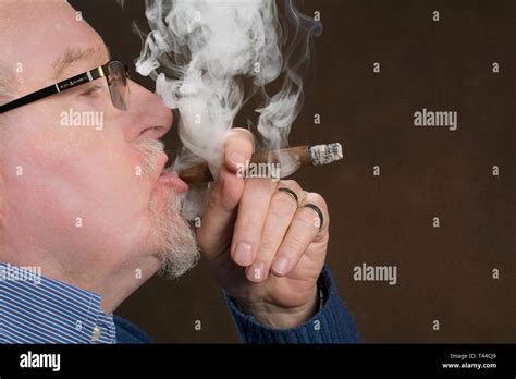 Old Man Smoking Cigar High Resolution Stock Photography And Images Alamy