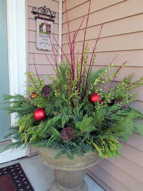 Christmas Outdoor Container Full Of Evergreens Red Twigs And Ornaments