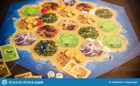 Settlers Of Catan Board Game On A Wooden Table Editorial Stock Image