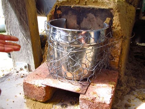 The rocket heater uses about one fourth the wood a typical wood stove because it burns all voc's completely. Rocket Stove Water Heater Redux - Milkwood: permaculture ...