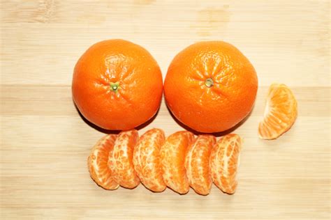 Two Oranges And Segments Free Stock Photo Public Domain Pictures