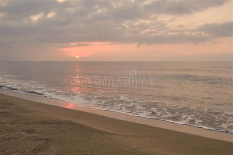 Cloudy Sunrise At Deserted Sandy Beach Stock Photo Image Of Light