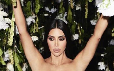 kim kardashian rocks skin tight dress in new viral campaign