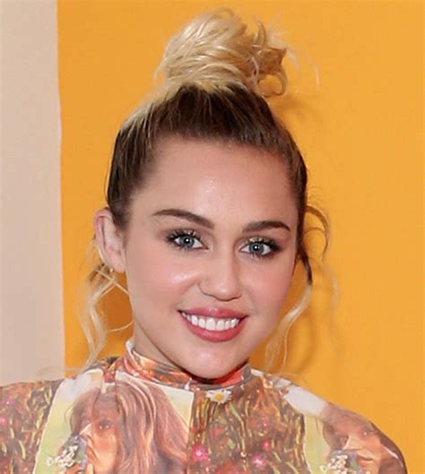 Miley Cyrus Just Rocked An Adorable Ruffled Flower Jumpsuit And We