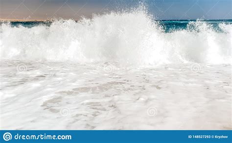 Closeup Image Of Calm Beautiful Sea Waves Rooling On The Sand At Beach