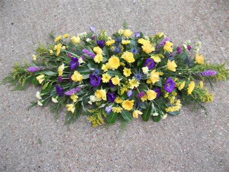 Double Ended Casket Spray Yellow And Blue Funeral Flowers Casket