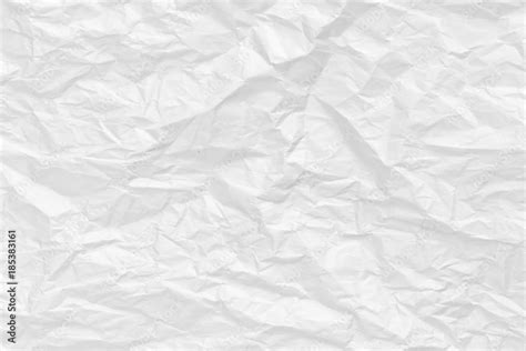 White Crumpled Paper Background And Texture Wrinkled Creased Paper