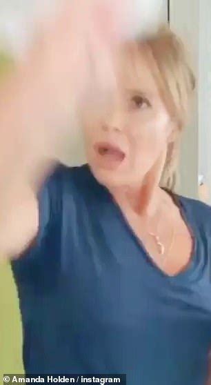 Amanda Holden Takes Part In Tik Tok Wipe It Down Challenge Daily Mail