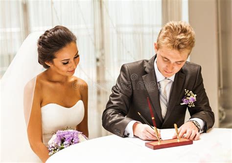 Bride Signing Marriage License Or Wedding Contract Stock Photo Image