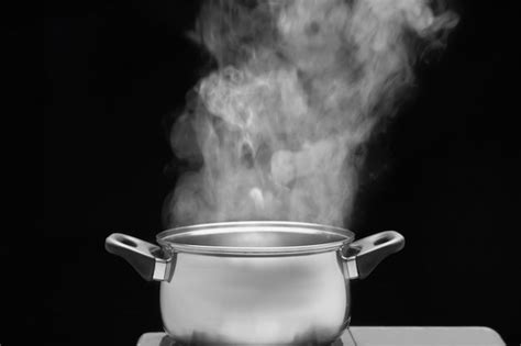Premium Photo Steam Over Cooking Pot In Kitchen