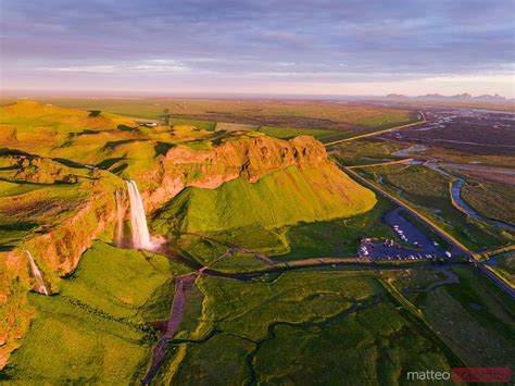 Aerial Drone Image Of Seljalandsfoss Waterfall At Sunset Iceland