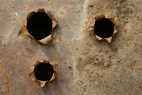 Rusty Bullet Hole Pictures Stock Photos Pictures And Royalty Free Images